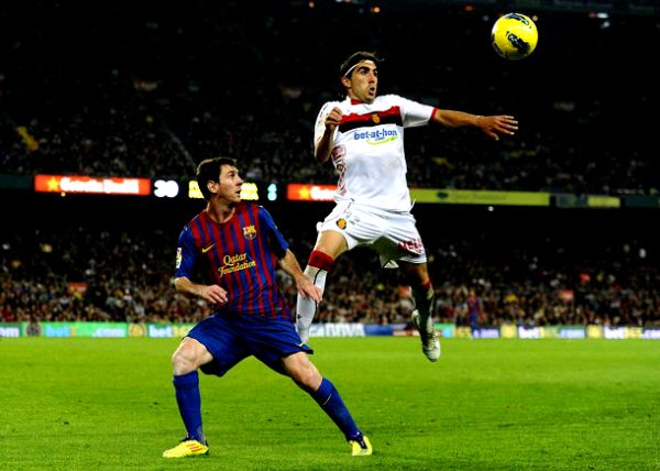 Leo Messi i Manuel Flores Chico; foto: Getty Images Leo Messi i Manuel Flores Chico; foto: Getty Images