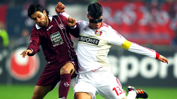 Olcay Sahan i Michael Ballack; foto: Bundesliga.de